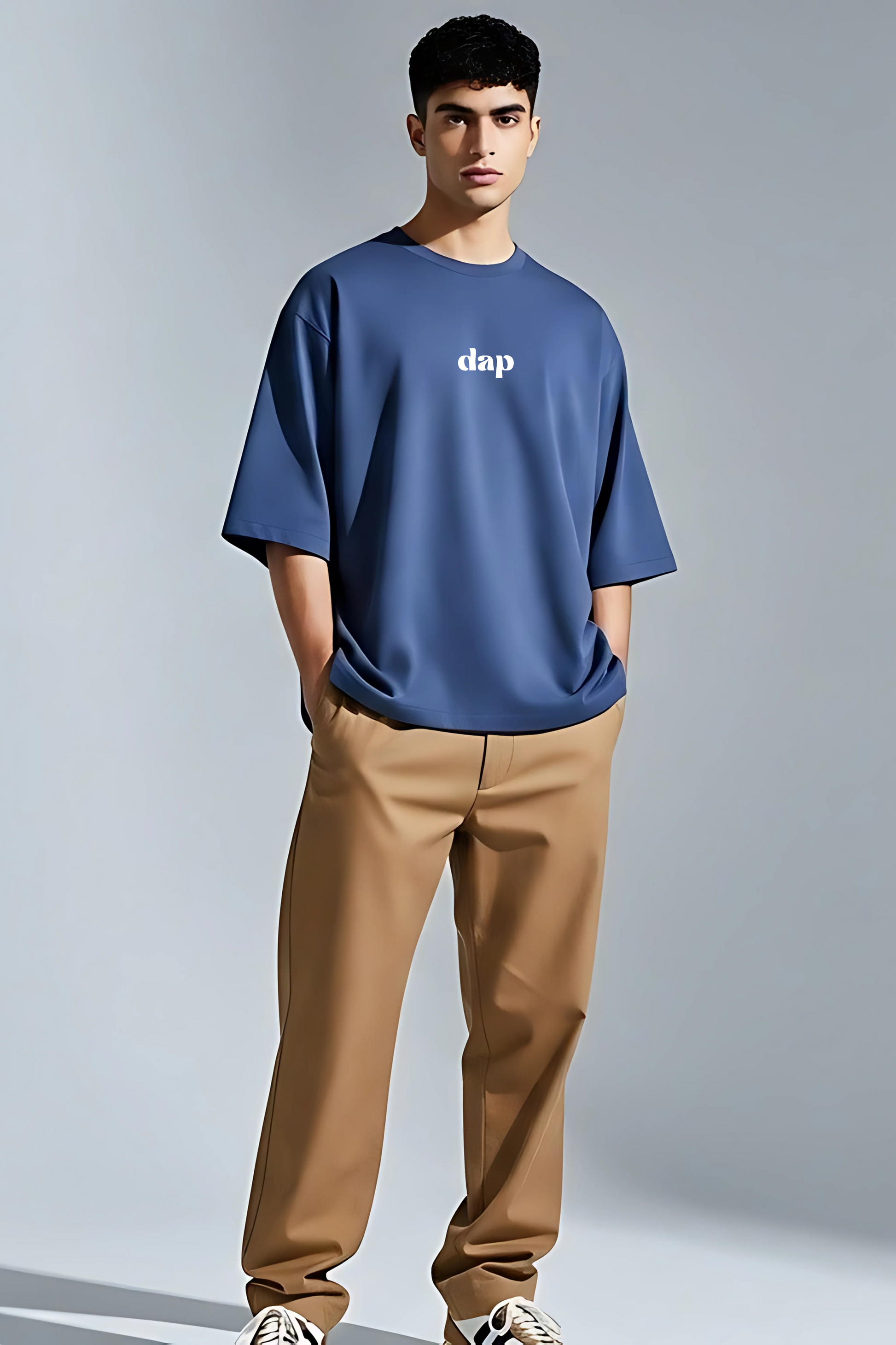 Front view of a comfortable cotton oversized navy blue Tshirt, showcasing the vibrant DTF print