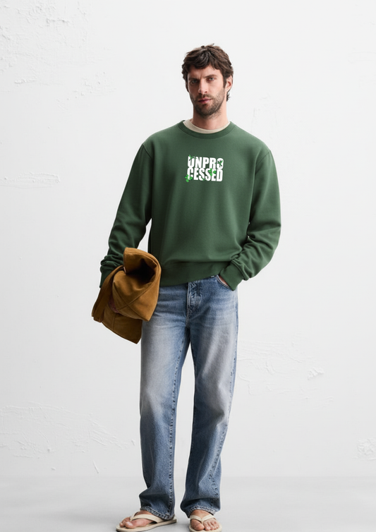 Man wearing a Dark green crewneck sweatshirt and blue jeans