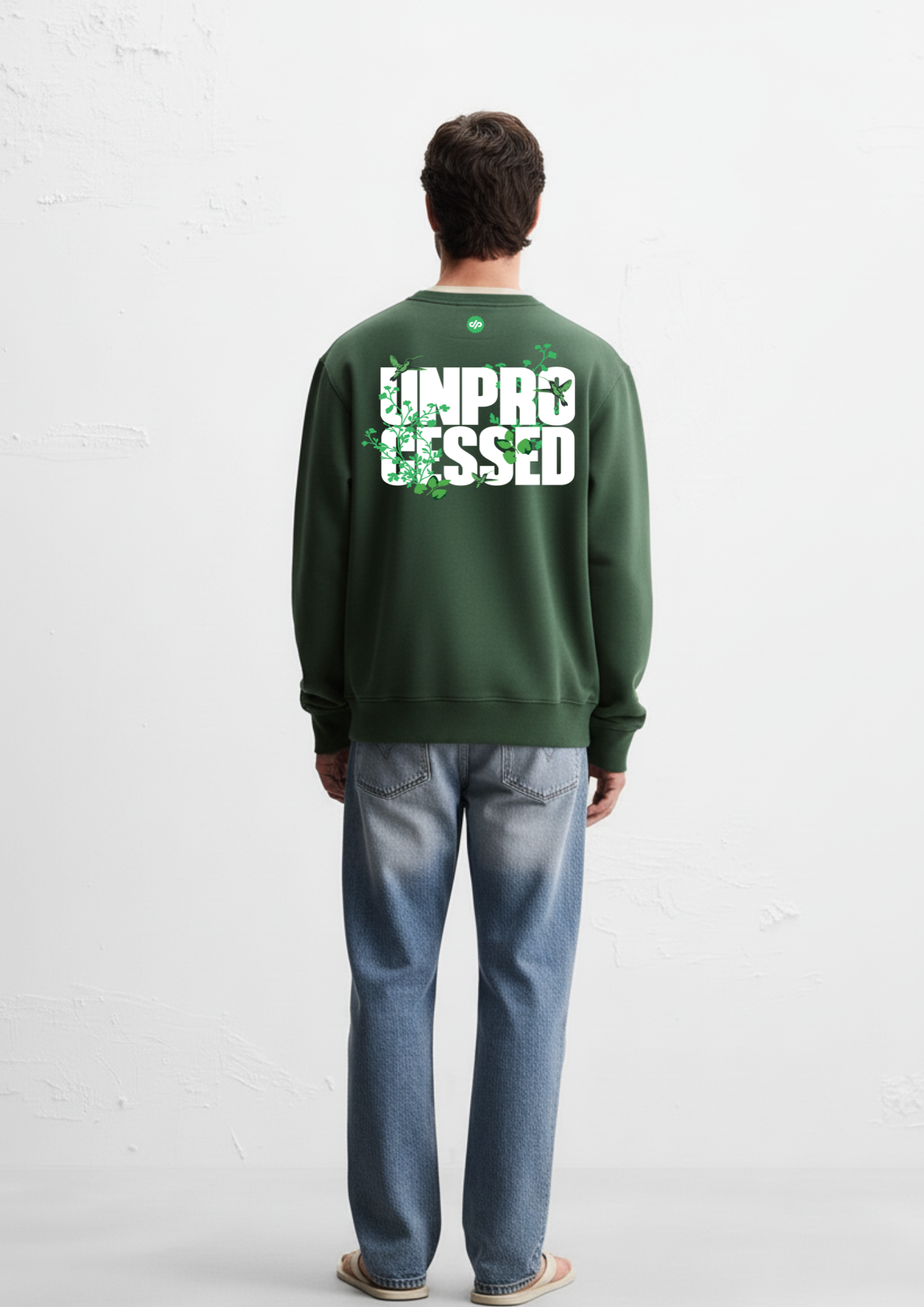 Person wearing a Dark green crewneck sweatshirt