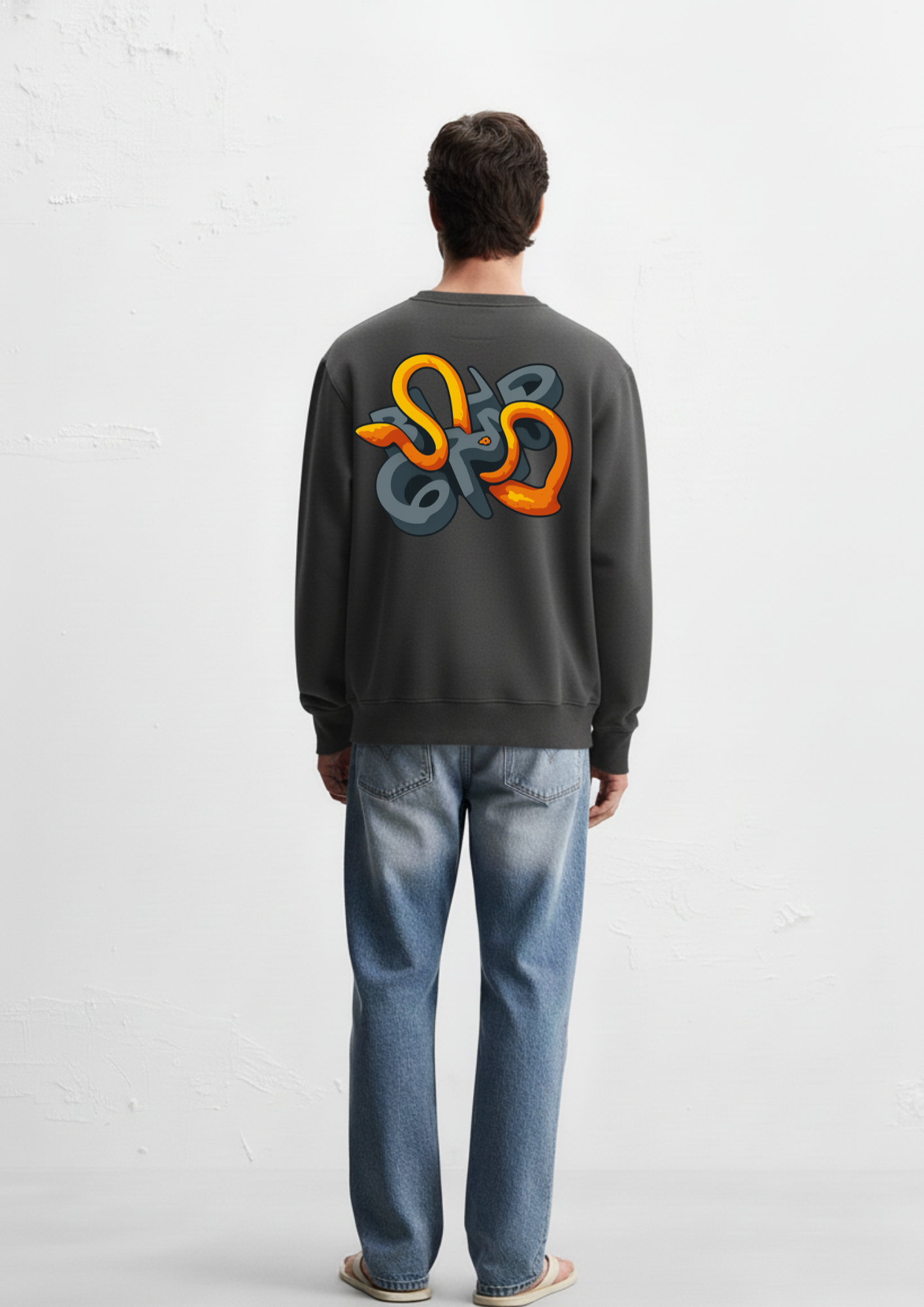 Person wearing a dark gray crewneck sweatshirt